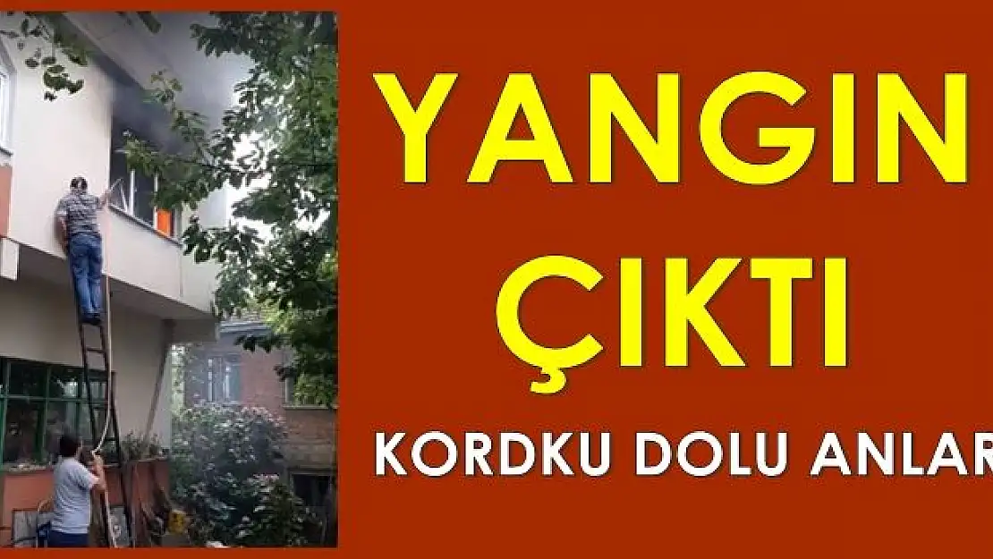 Korkutan yangına hortumla müdahale