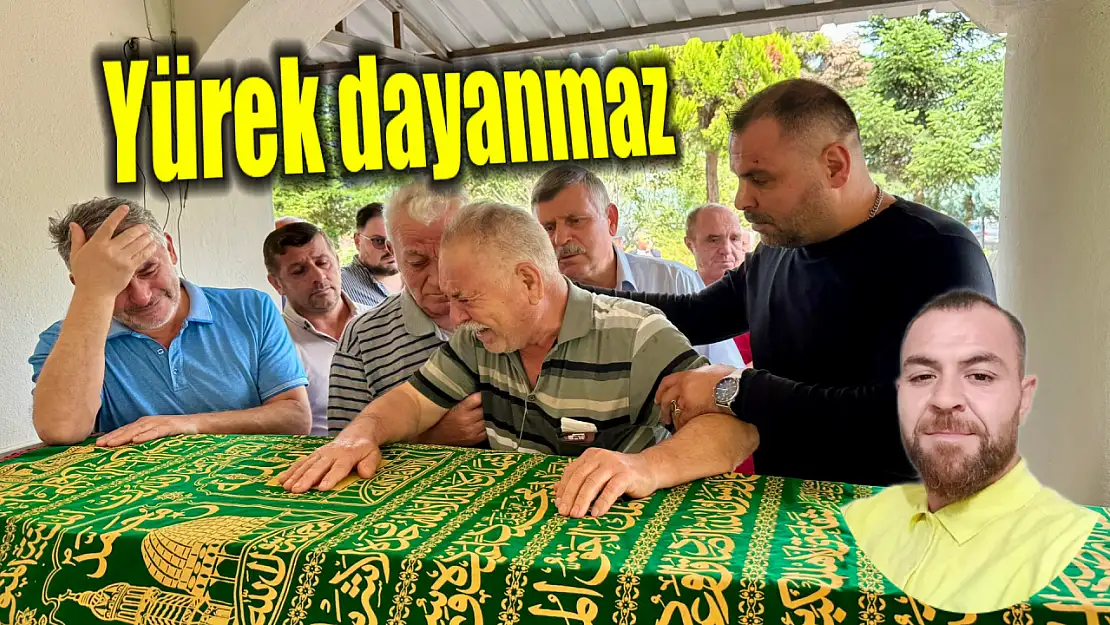 Oğlunun tabutunun başında gözyaşı döktü