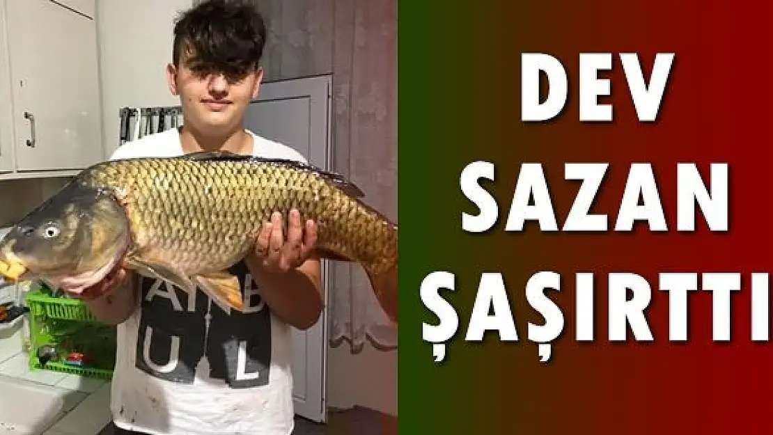 Yakaladığı dev sazanla böyle poz verdi