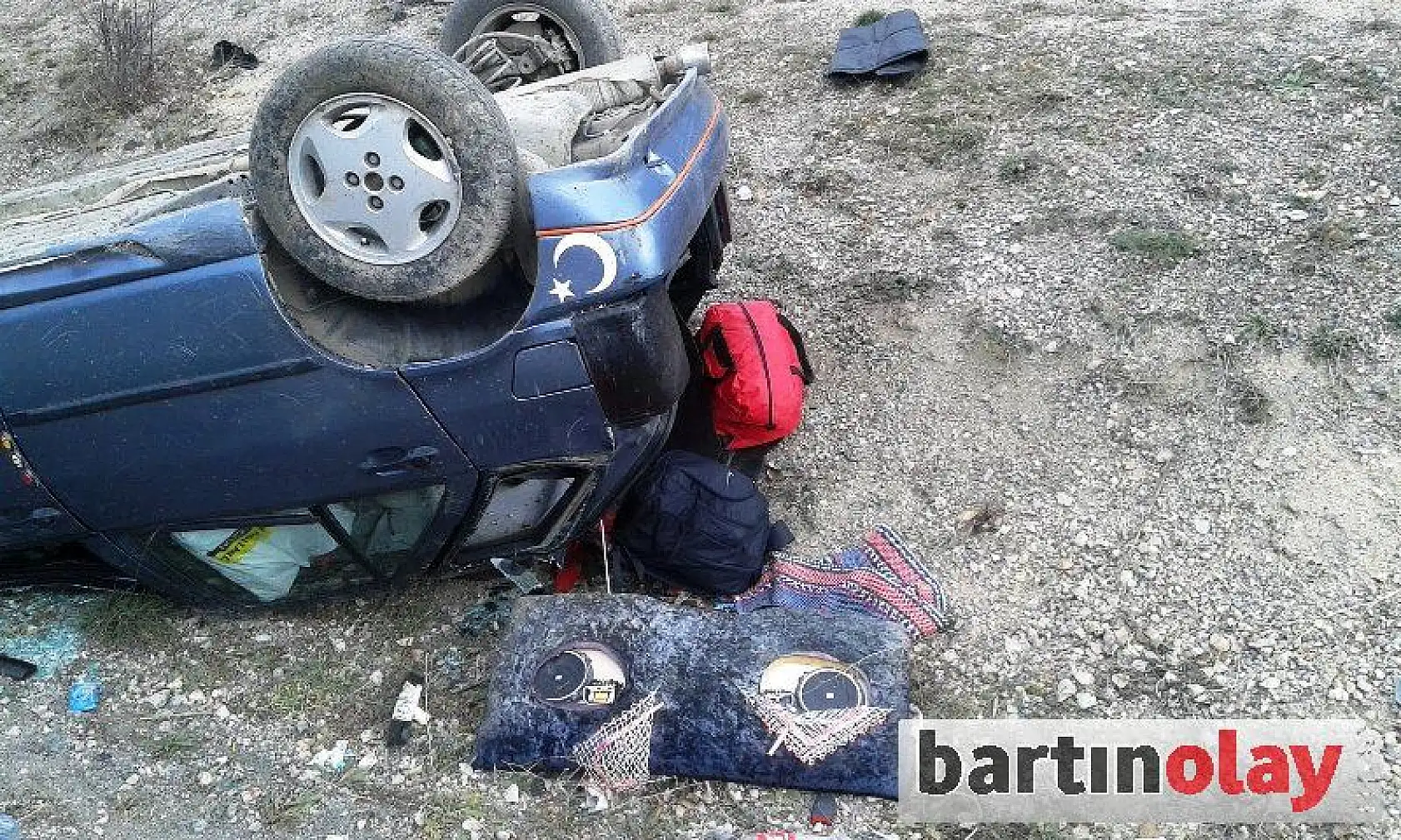 Takla atan otomobil şarampole yuvarlandı