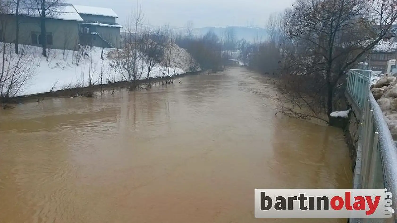 Karlar eriyor, ırmak yükseliyor