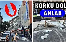 Binadan kopan parçalar kaldırıma düştü