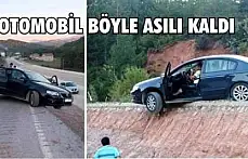 OTOMOBİL BÖYLE ASILI KALDI