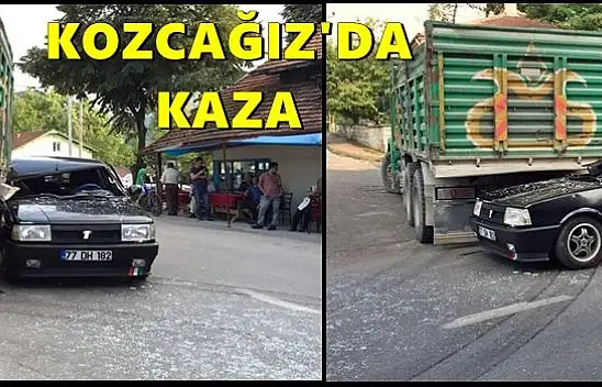 Otomobil geri manevra yapan kamyonun altına girdi