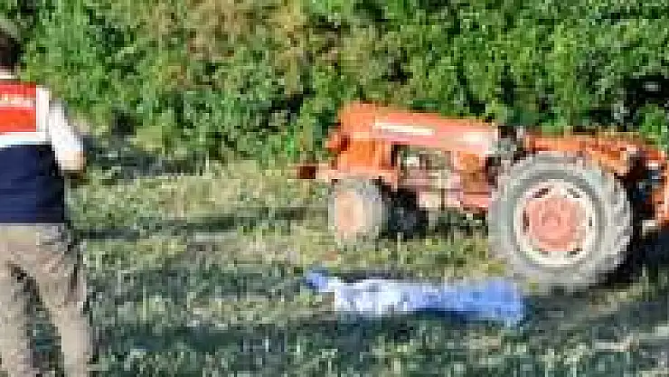 DEVRİLEN TRAKTÖRÜN ALTINDA CAN VERDİ