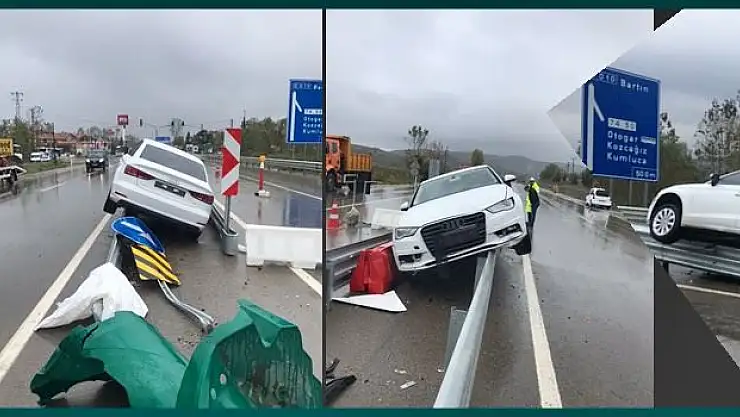 Otomobil bariyerlerin üzerine çıktı