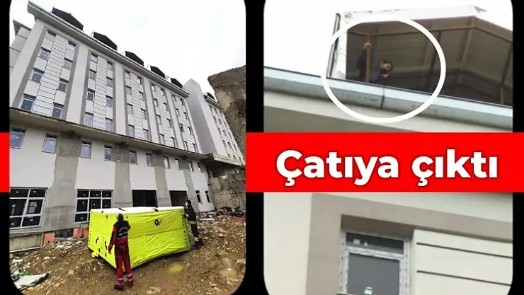 Yurt binasının çatısına çıktı
